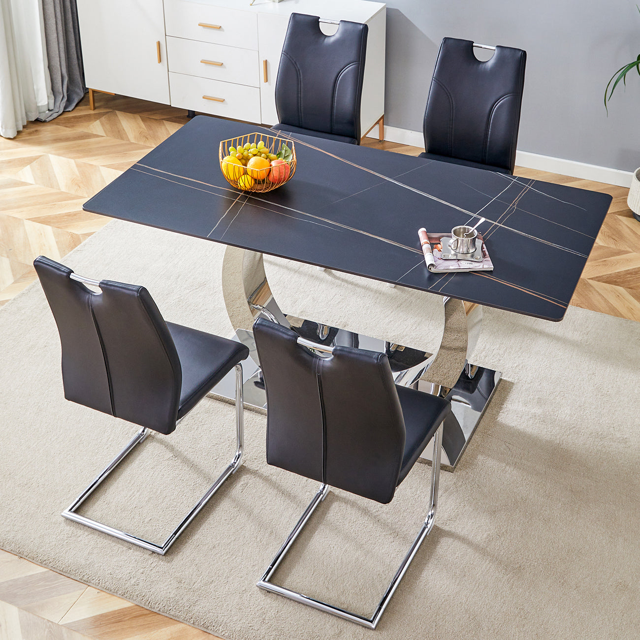 Table and chair set.63x31.5-inch Sintered Stone Dining Table.Paired with 4 Uniquely designed black dining chairs with Silver Metal Leg.Black Texture Design Tabletop,Silver stainless steel table leg.