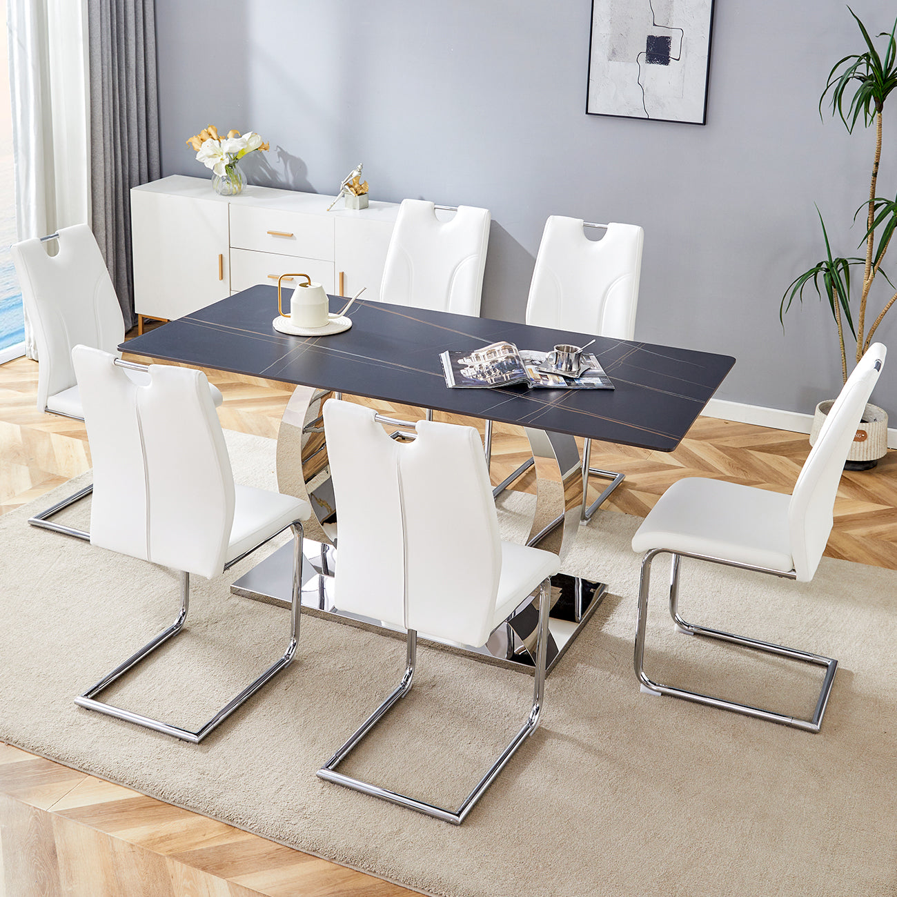 Table and chair set.63x31.5-inch Sintered Stone Dining Table.Paired with 6 Uniquely designed white dining chairs with Silver Metal Leg.Black Texture Design Tabletop,Silver stainless steel table leg.