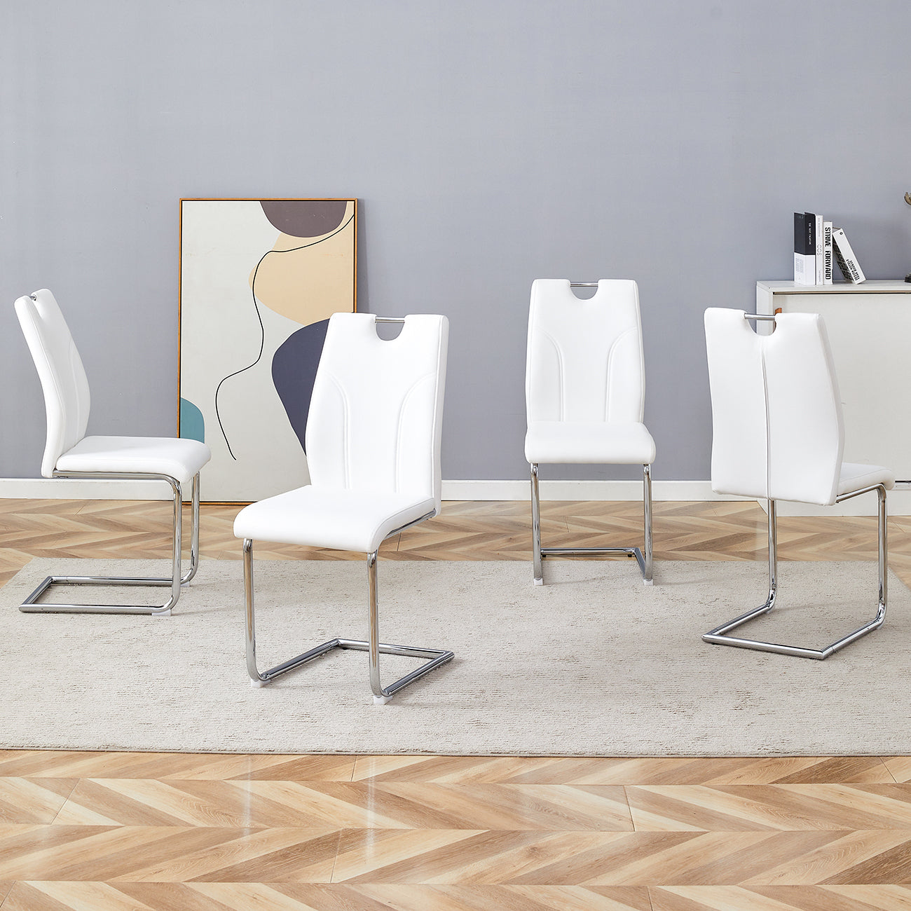 White PU Dining Chair Set.Uniquely designed white dining chairs. PU material, paired with silver metal chair legs. Suitable for offices, restaurants, kitchens, conference rooms, etc.(Set of 4)
