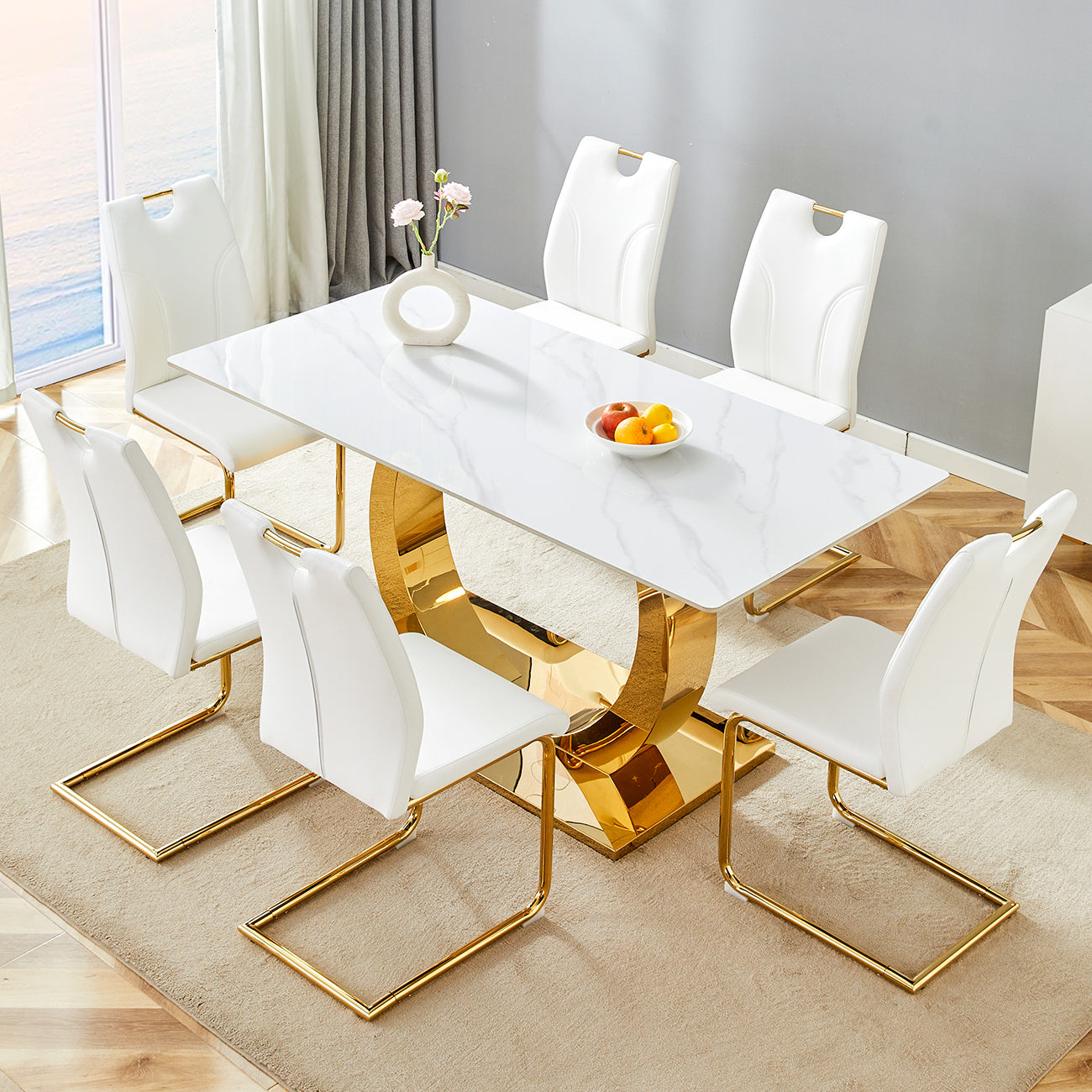 Table and chair set.63x31.5-inch Sintered Stone Table.Paired with 6 Uniquely designed white dining chairs with Golden Metal Leg.Modern Snow Mountain Stone White Design TableTop,Golden metal legs.