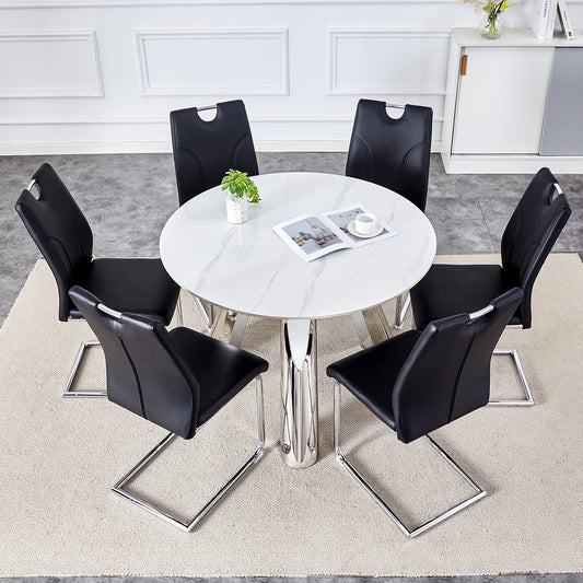 Table and chair set.A 42-inch stainless steel leg round table .Paired with 6 Uniquely designed Black Dining Chairs With Silver Metal Leg.Sintered Stone Tabletop,Stainless Steels Table Legs.