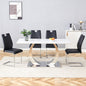 Table and chair set.63x31.5x30-inch Sintered Stone Dining Table - A Perfect Blend of Durability and Elegance.Paired with 4 Uniquely designed Black Dining Chairs With Silver Metal Leg.
